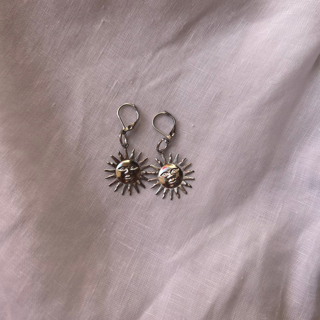Stainless steel sun earrings