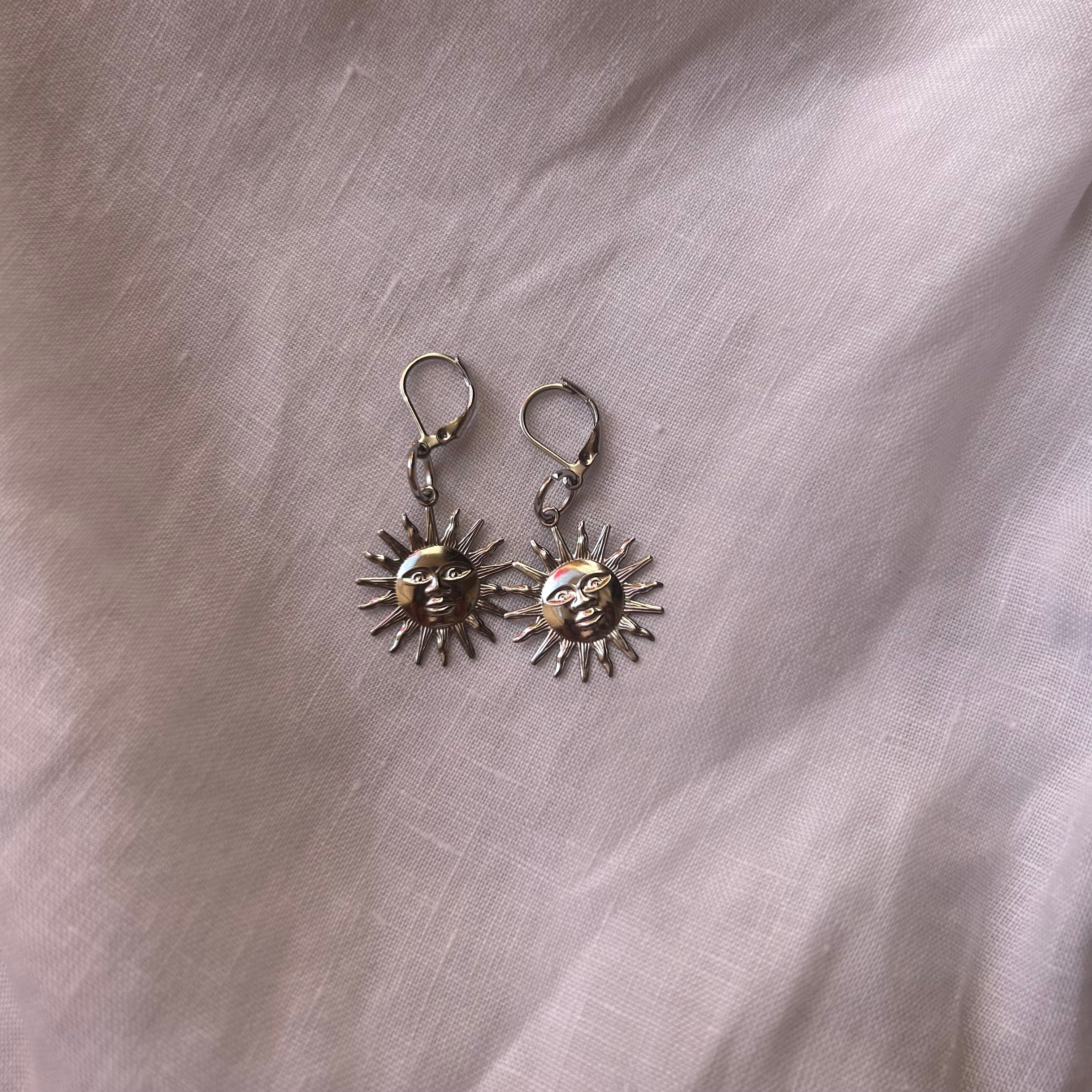 Stainless steel sun earrings