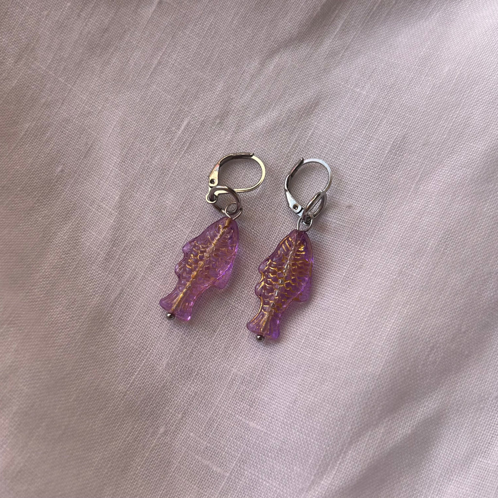 Gold on purple fish earrings
