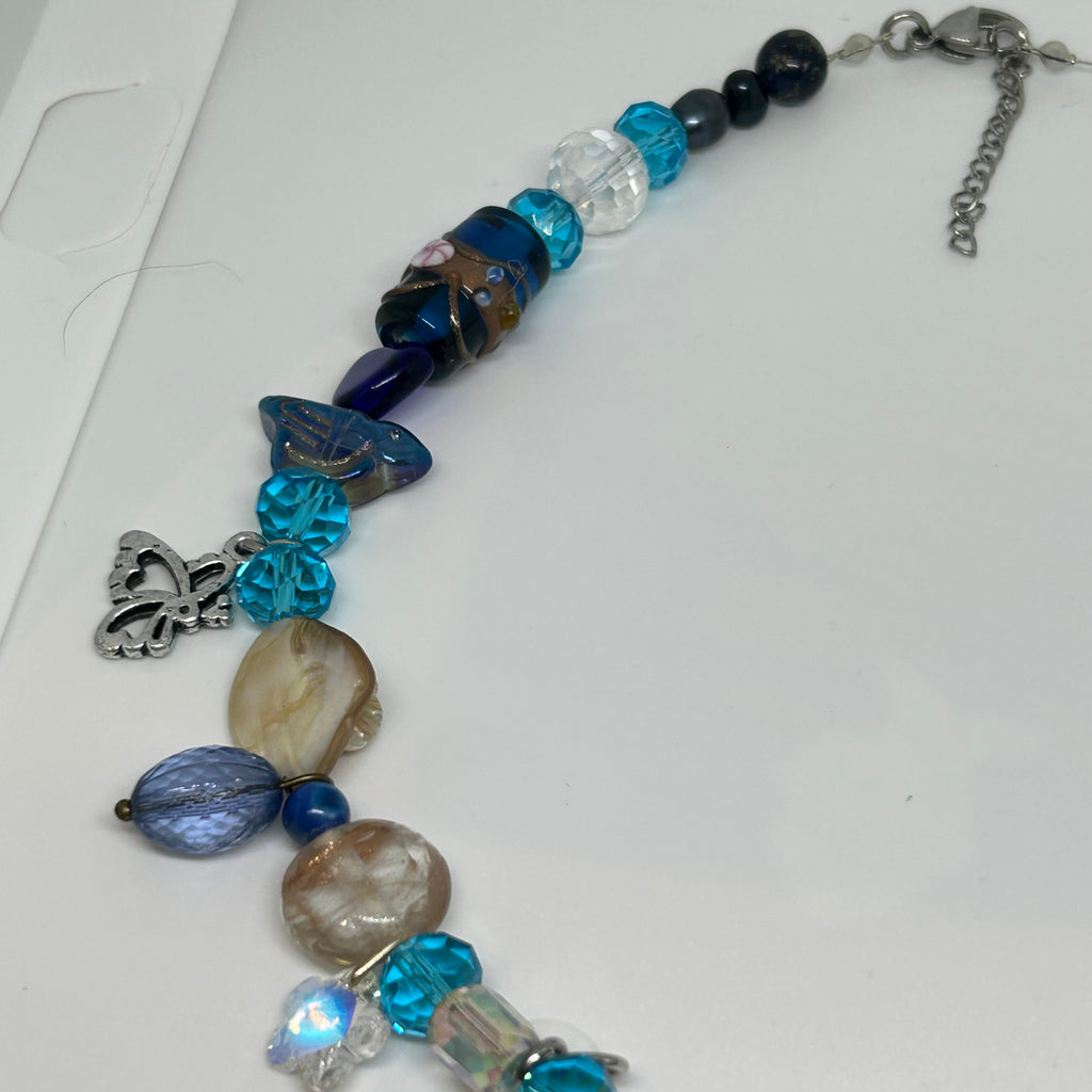 Blue charm watch ravel face necklace