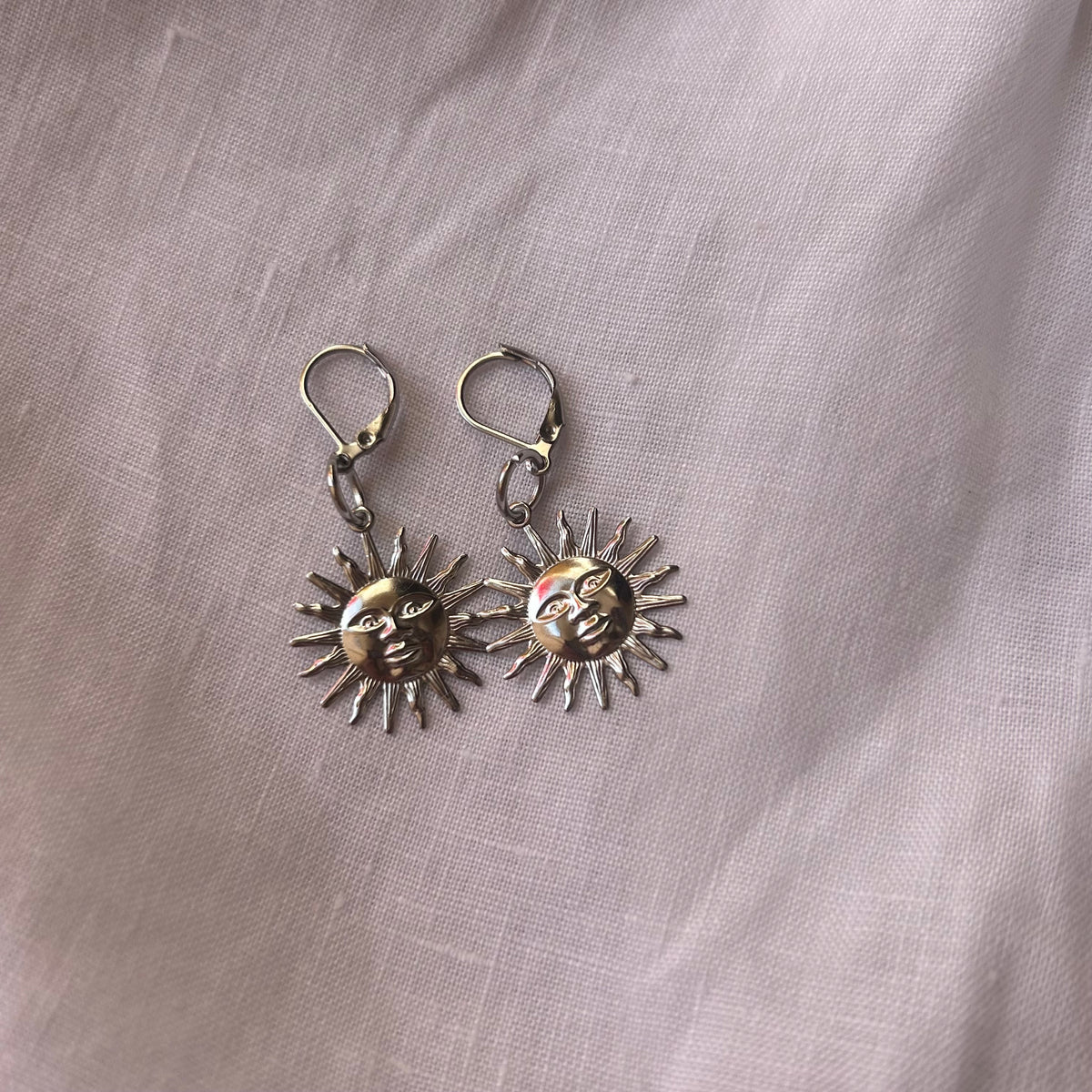 Stainless steel sun earrings