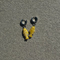 chalk yellow fish earrings