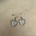 White and black polka dot resin heart earrings
