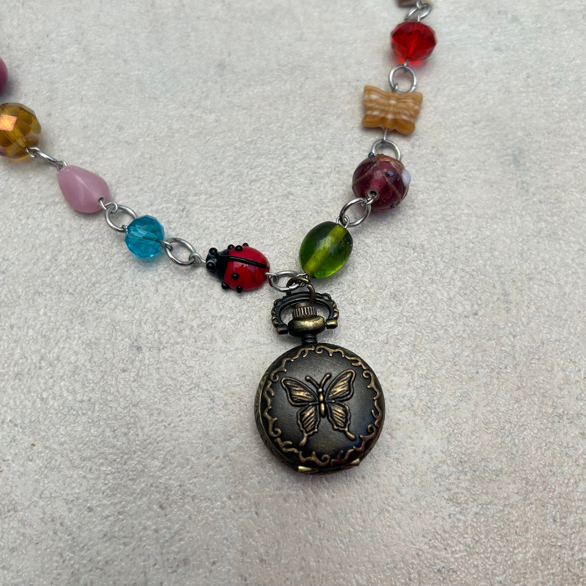 Glass beaded ladybug necklace