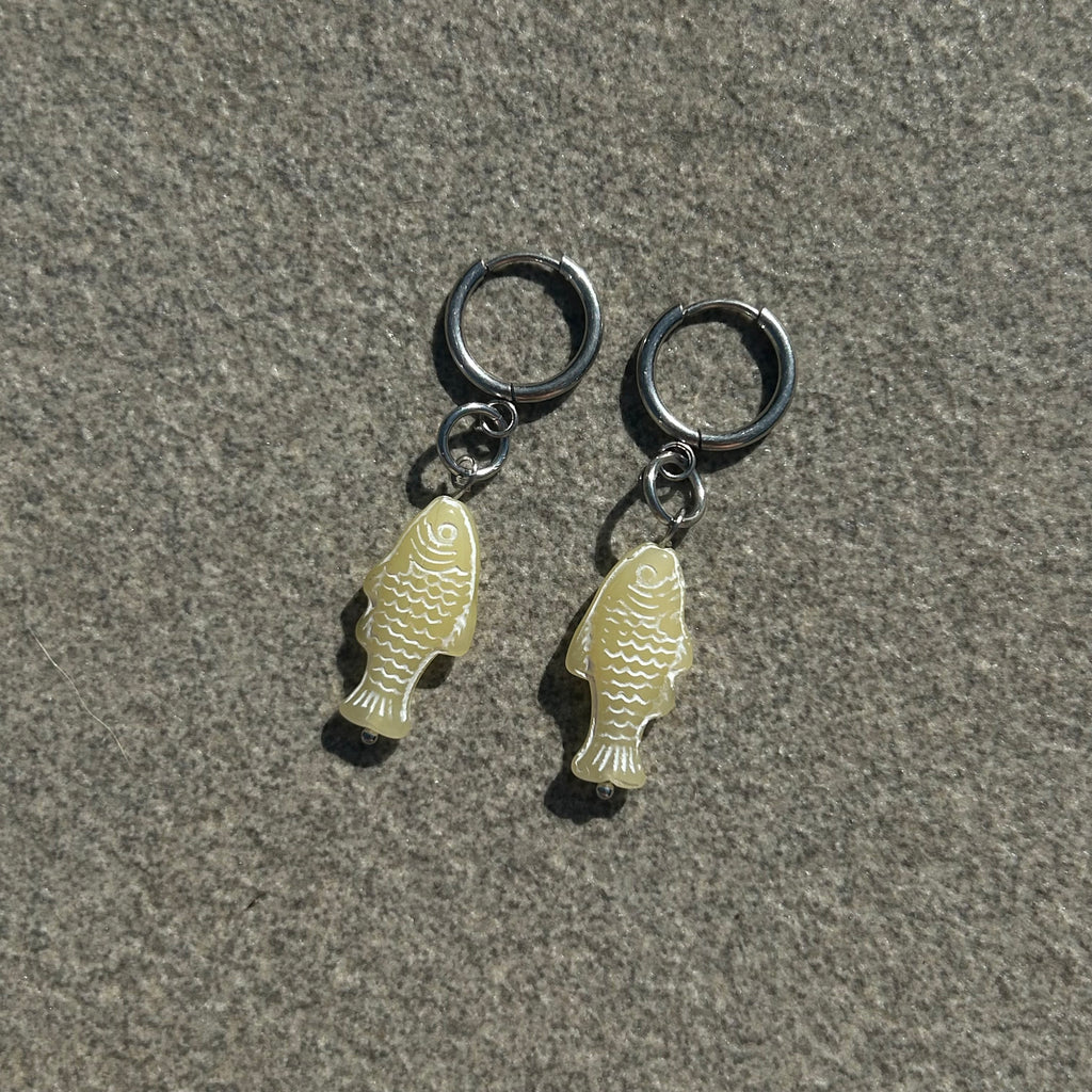 chalk baby yellow fish earrings