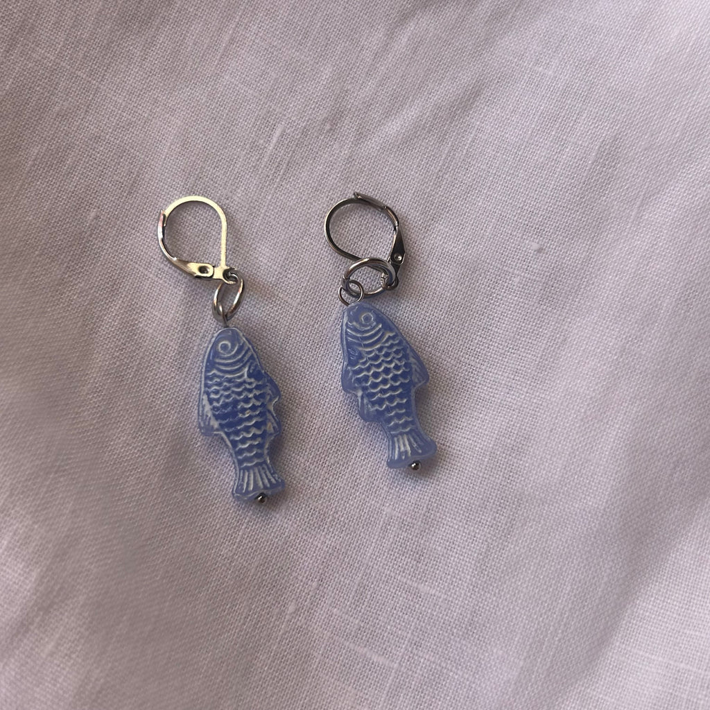 White on blue fish earrings