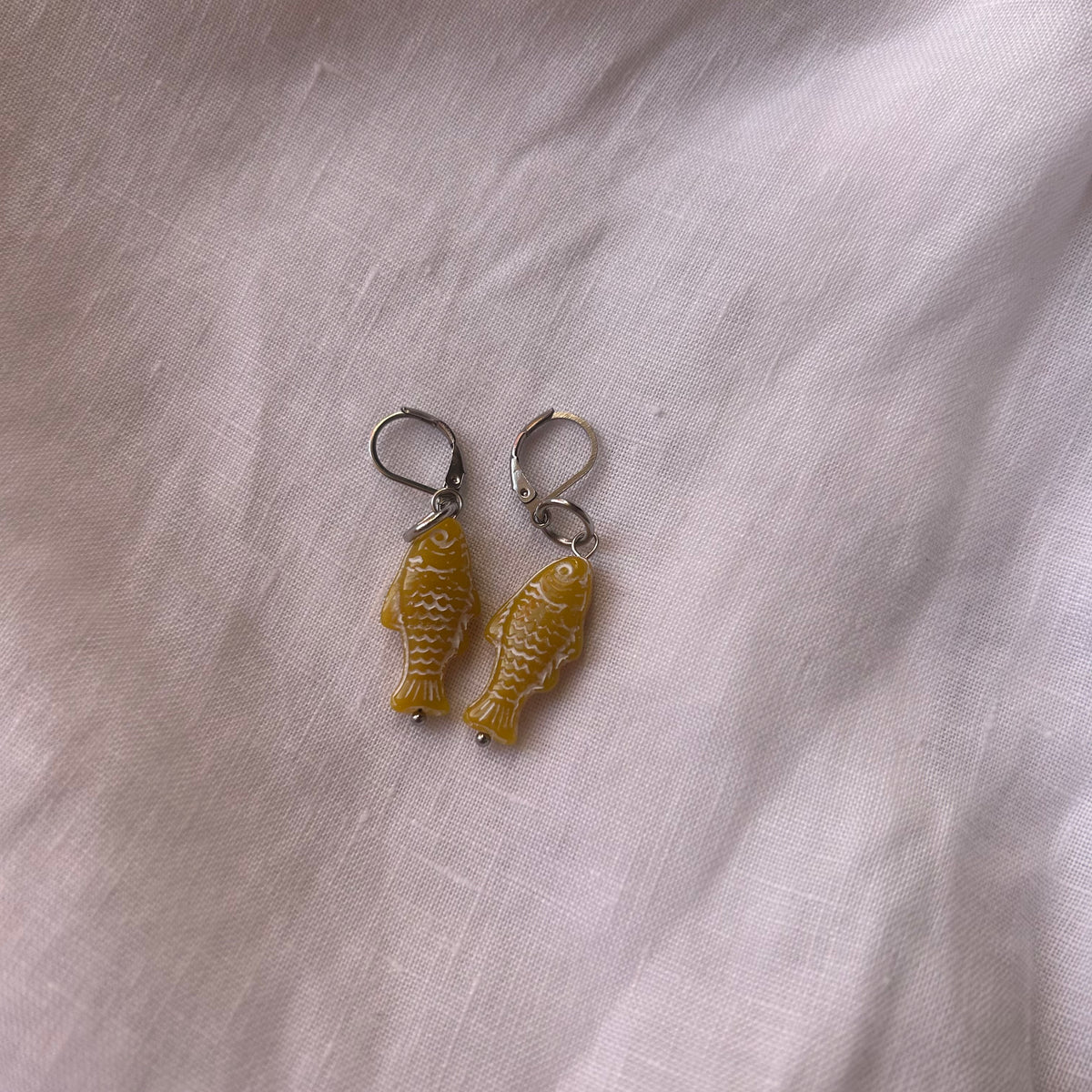 Mustard yellow fish earrings