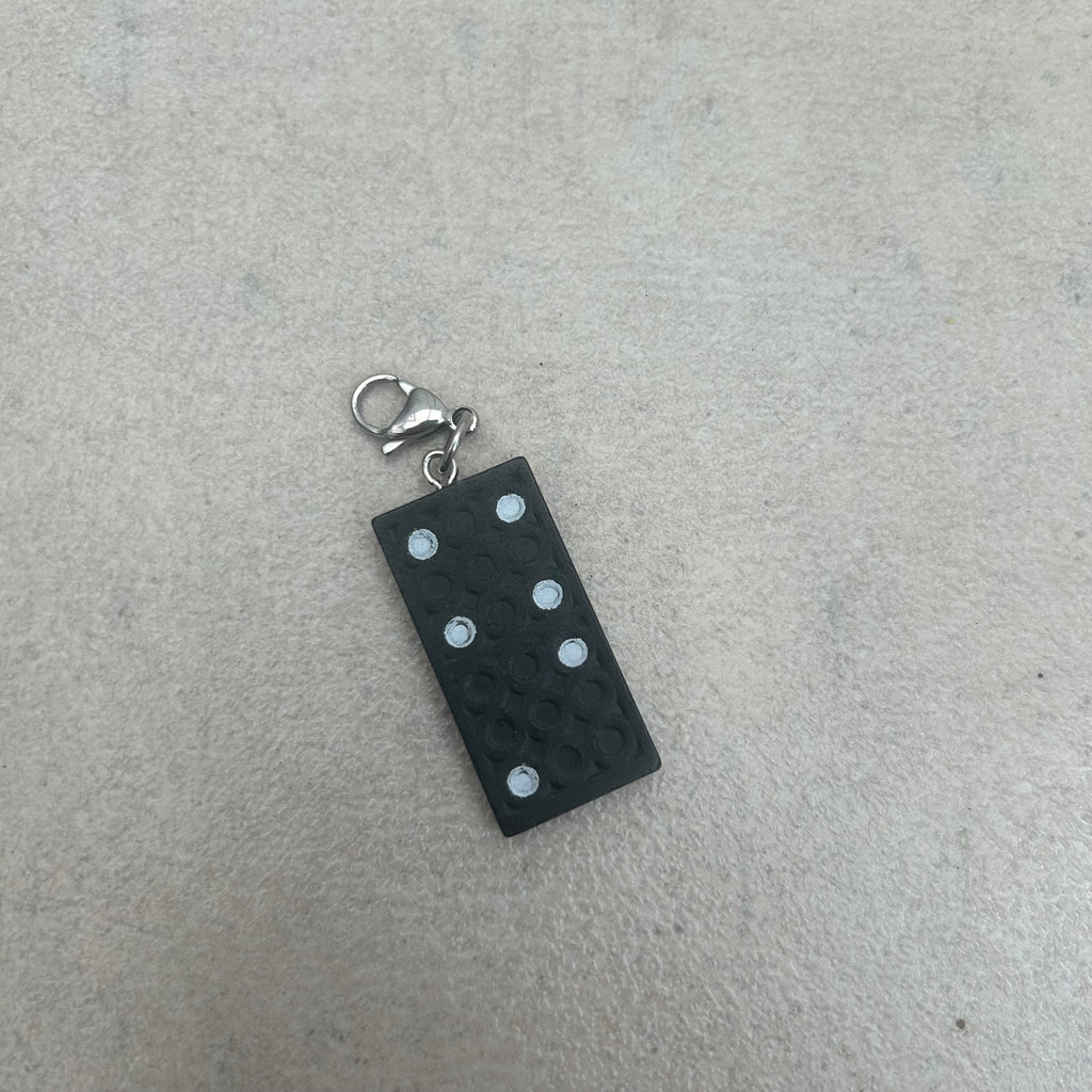 Domino charm