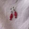 White on red fish earrings