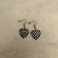Black and white polka dot resin heart earrings