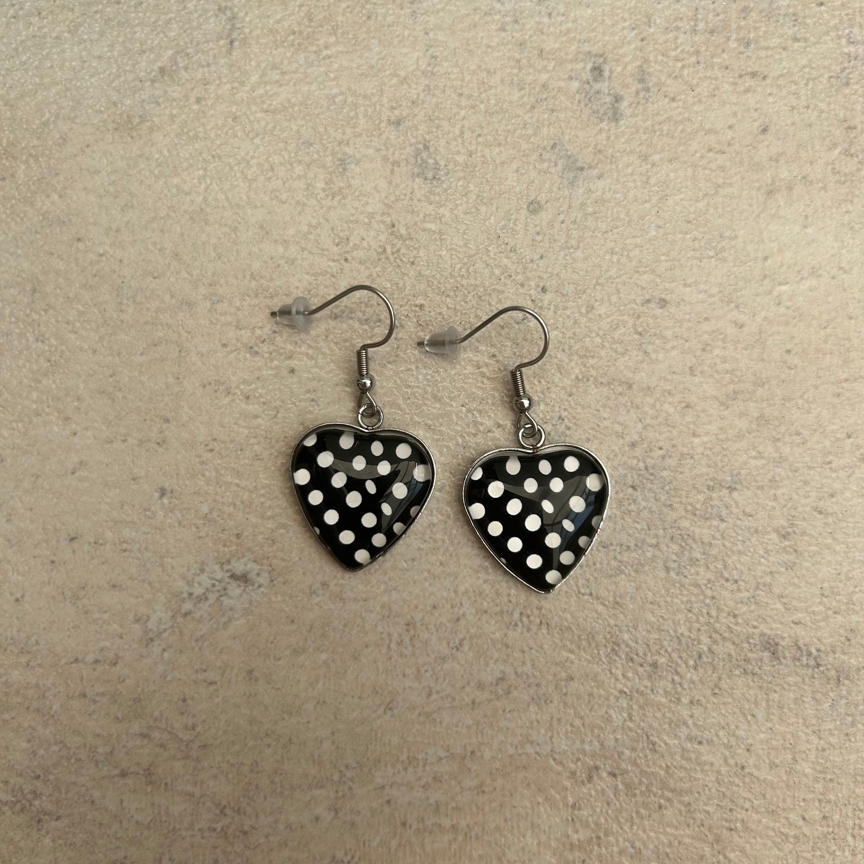 Black and white polka dot resin heart earrings