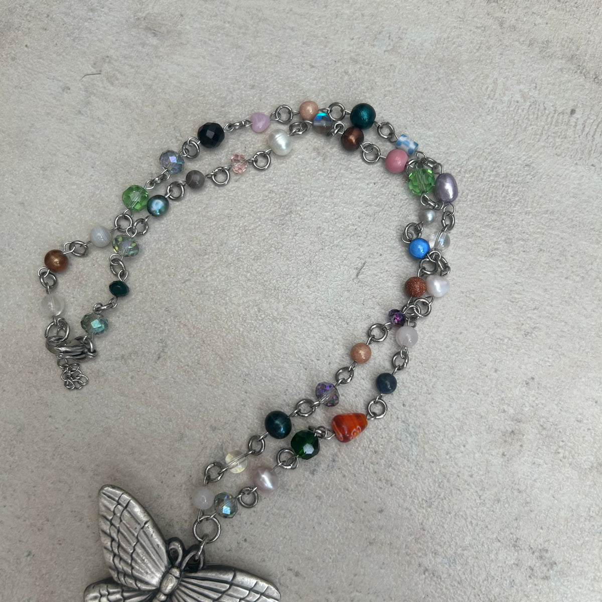 Butterfly weighted beaded necklace