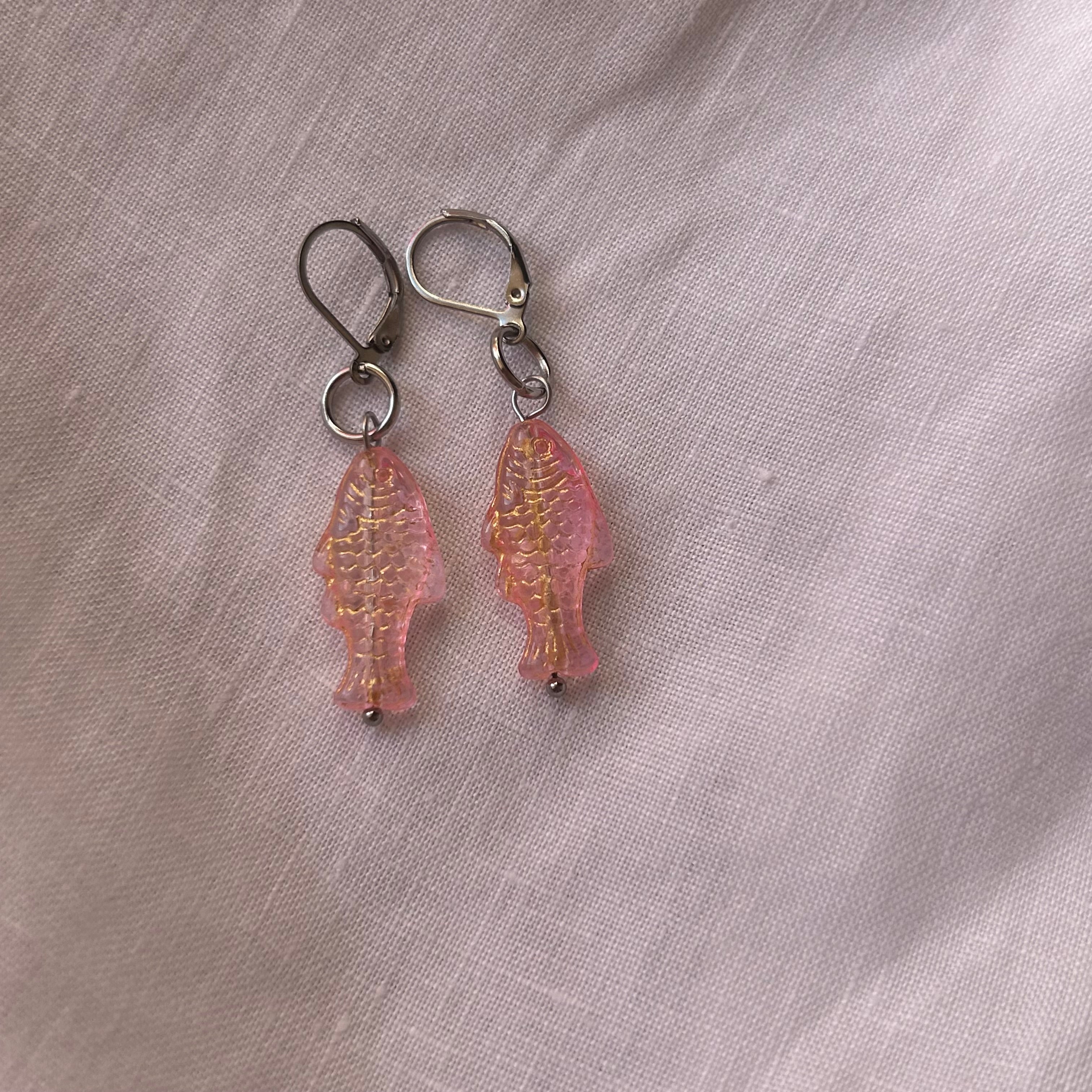 Gold on jelly pink fish earrings