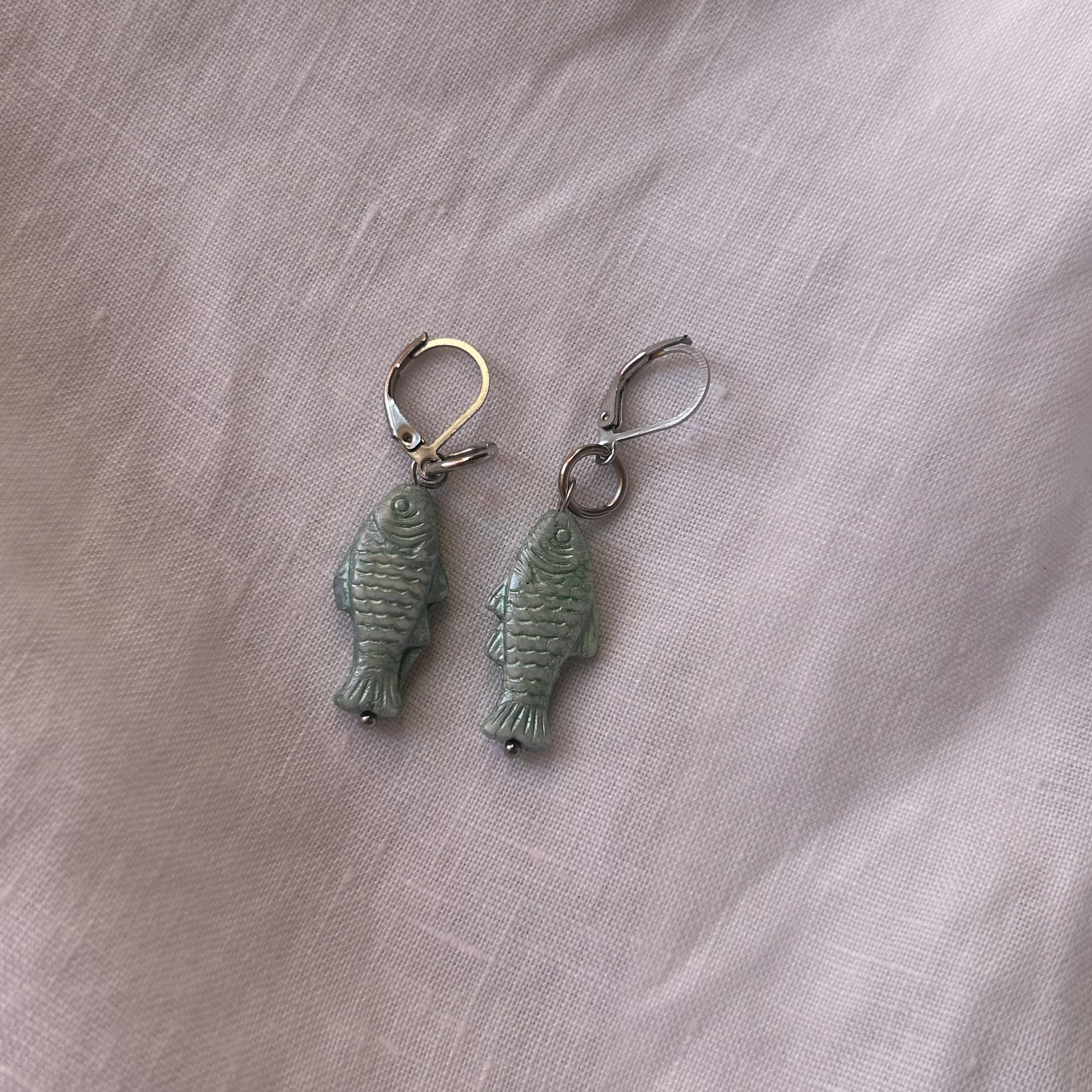 Teal glass fish earrings
