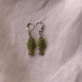Gold on green fish earrings