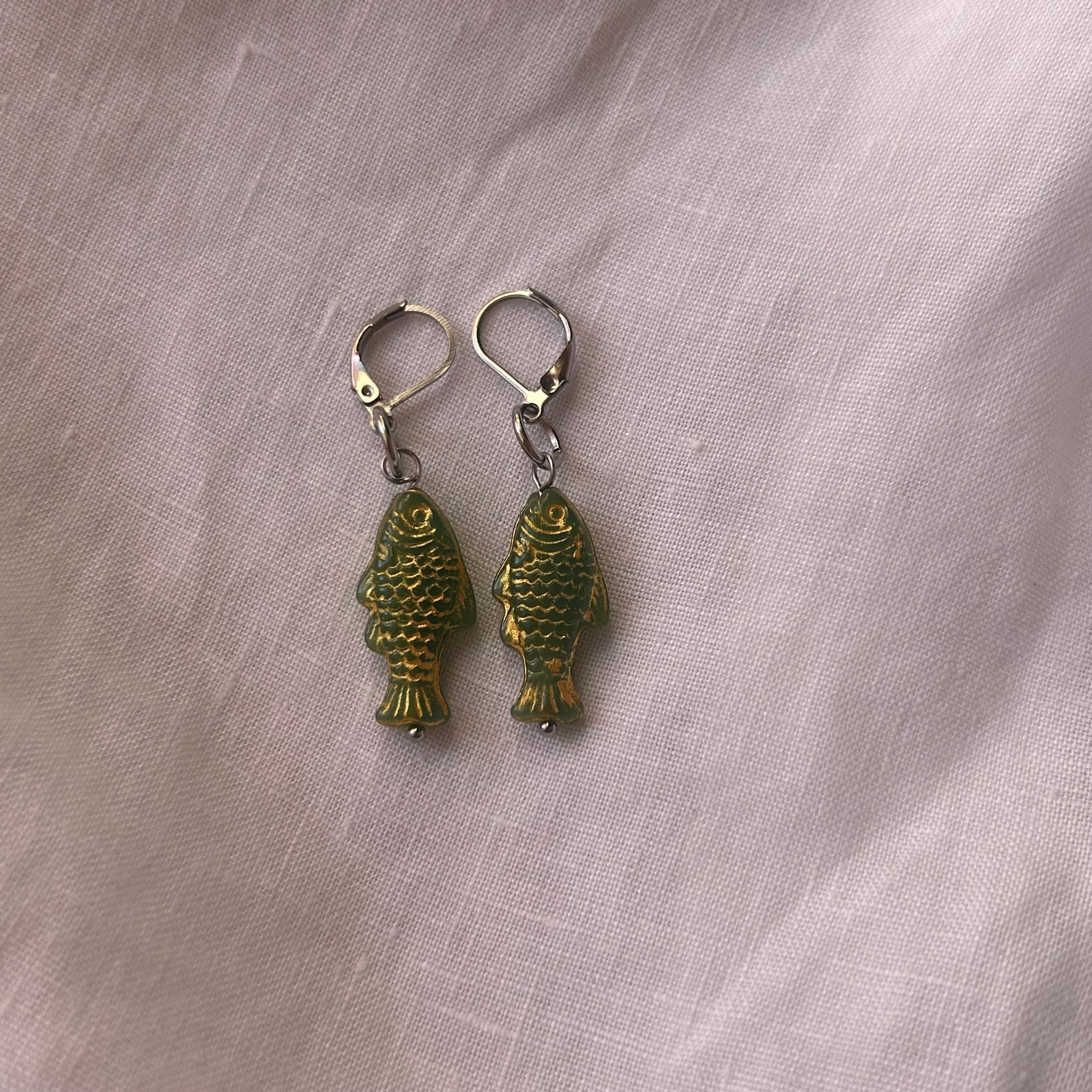 Gold on green fish earrings