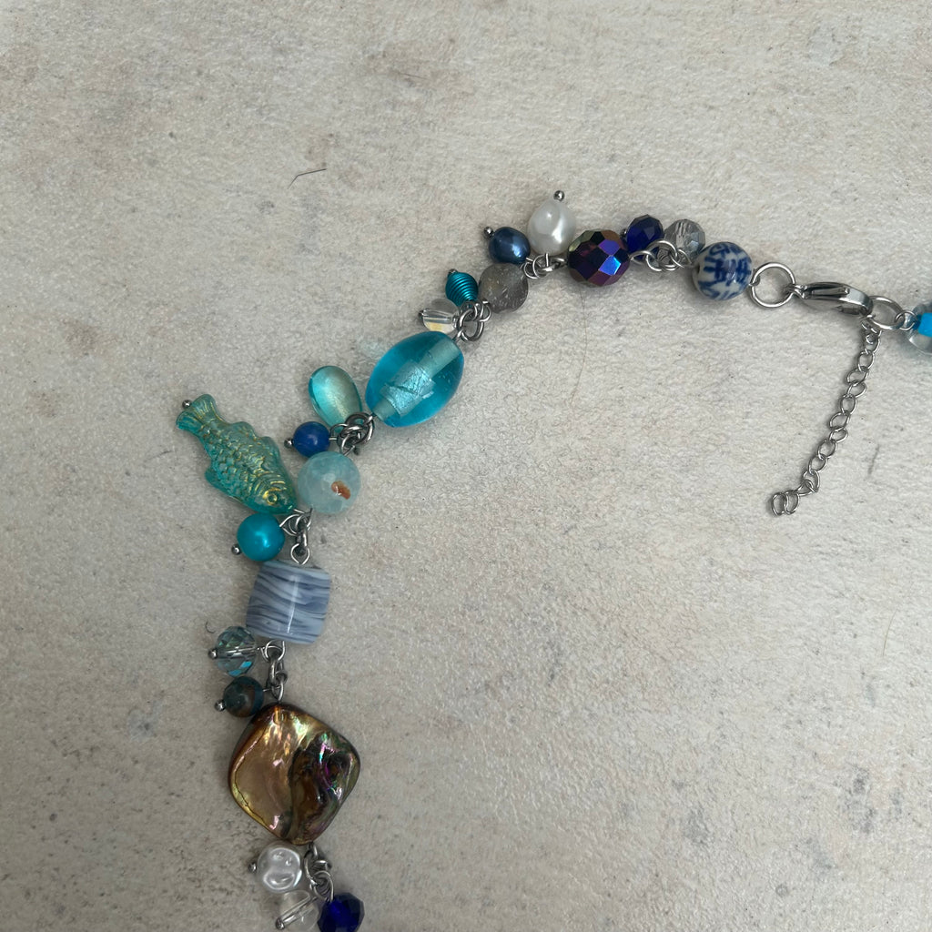 Blue cluster clutter fish beaded necklace