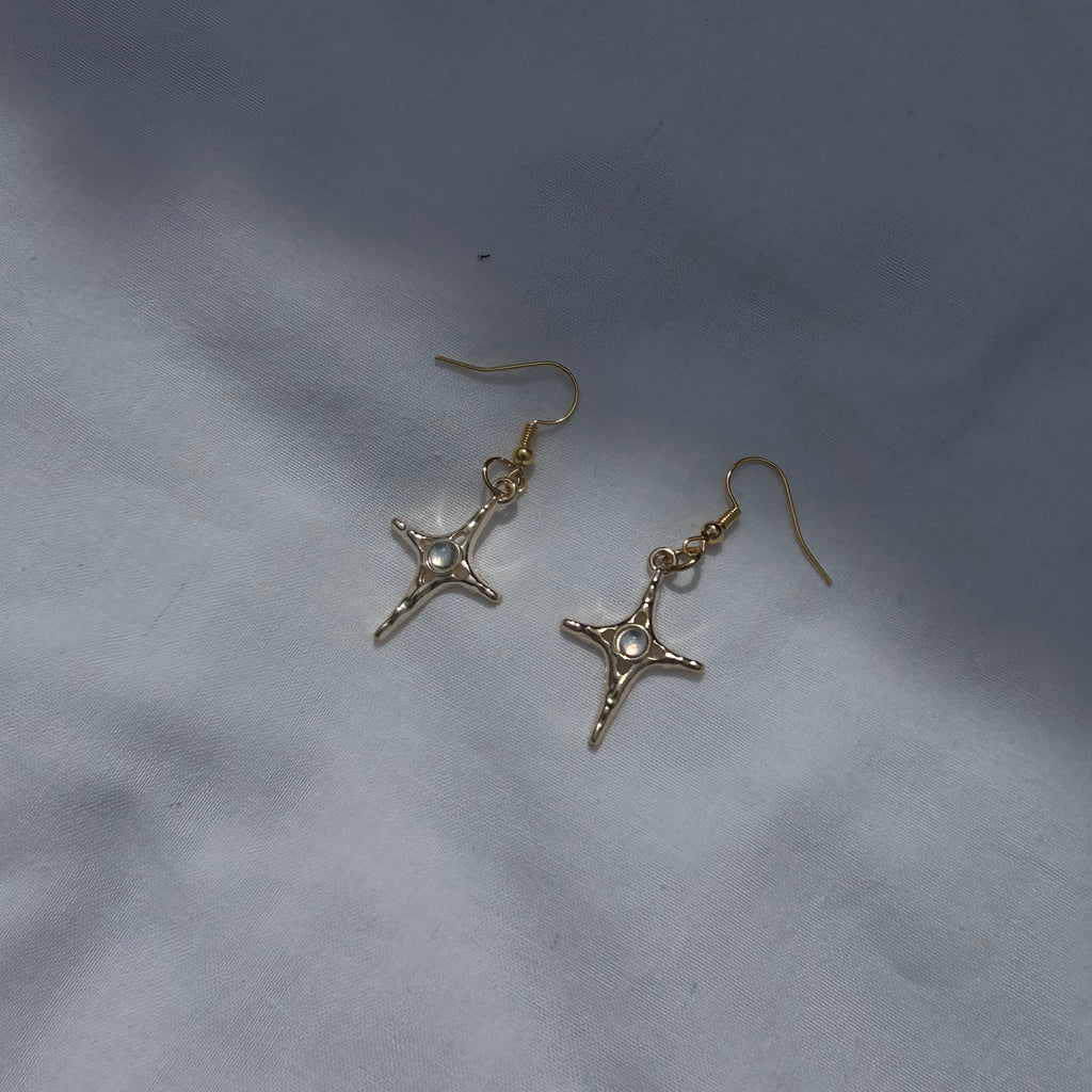 Constellation star in gold earrings