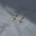 Constellation star in gold earrings
