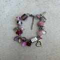 Pink cross cluster bracelet