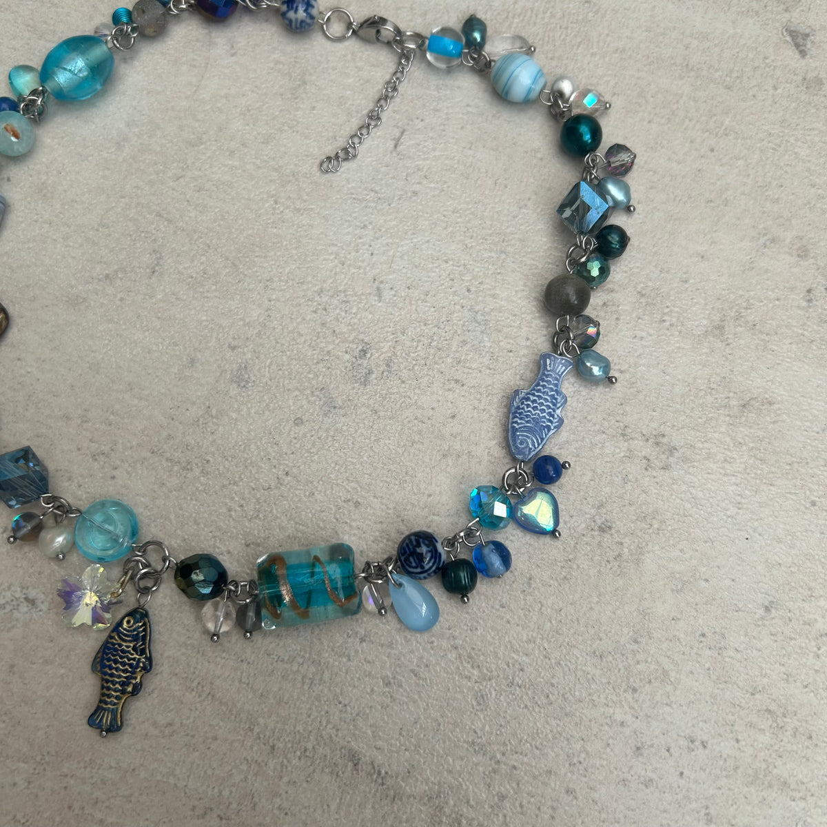 Blue cluster clutter fish beaded necklace