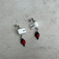 Tooth bug earrings