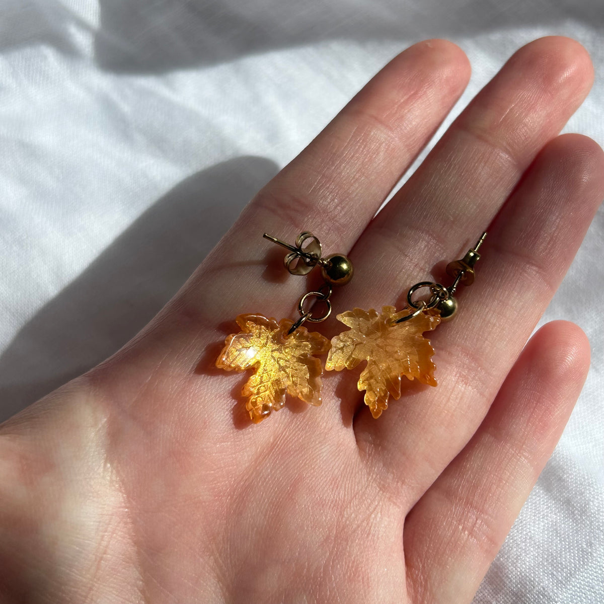Gold stud glass earrings