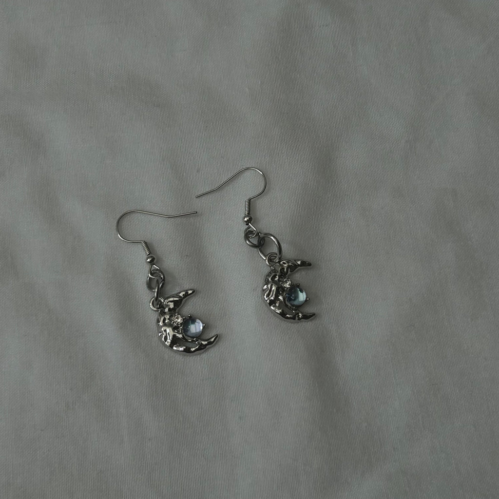 Silver crescent moon earrings