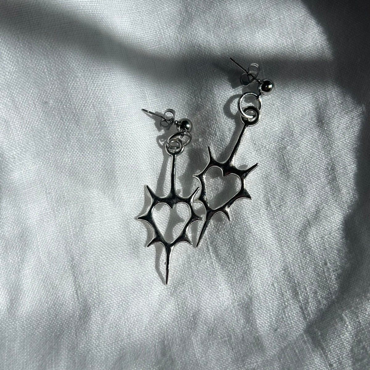 Heart spike stud earrings