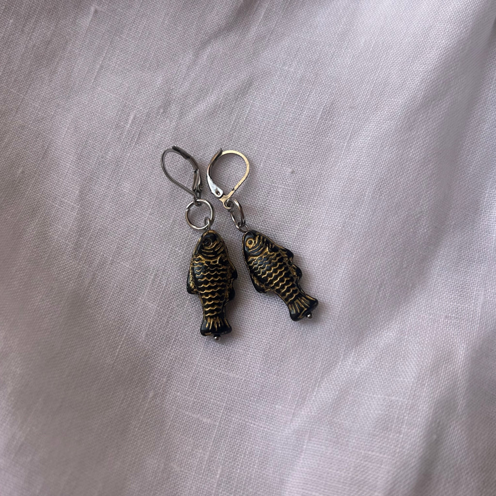 Gold on black fish earrings