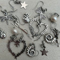 mystery earrings (silver tones)