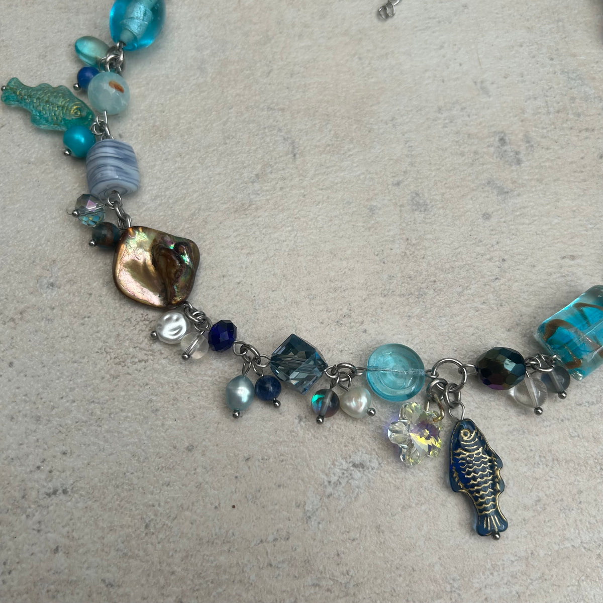 Blue cluster clutter fish beaded necklace