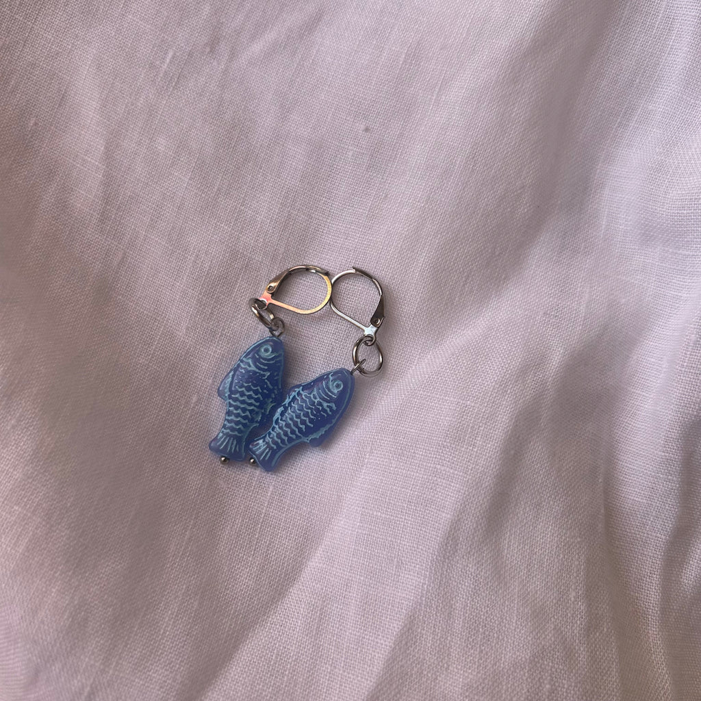 White on blue fish earrings
