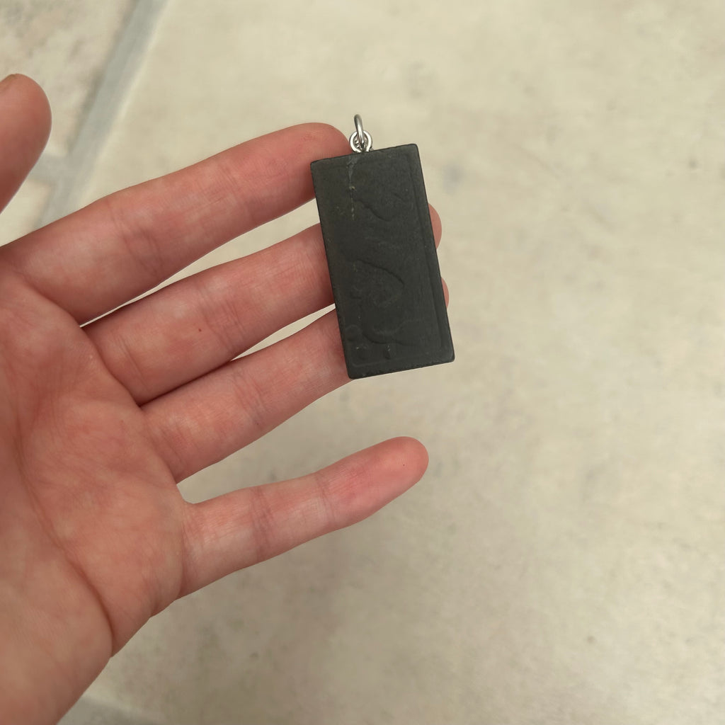 Domino charm