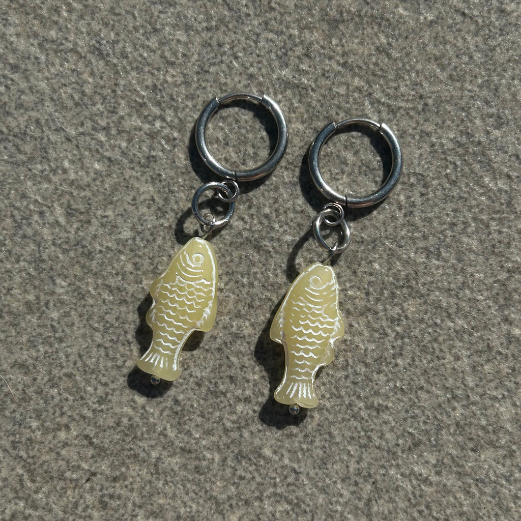 chalk baby yellow fish earrings
