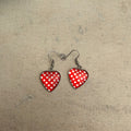 Red and white polka dot resin heart earrings