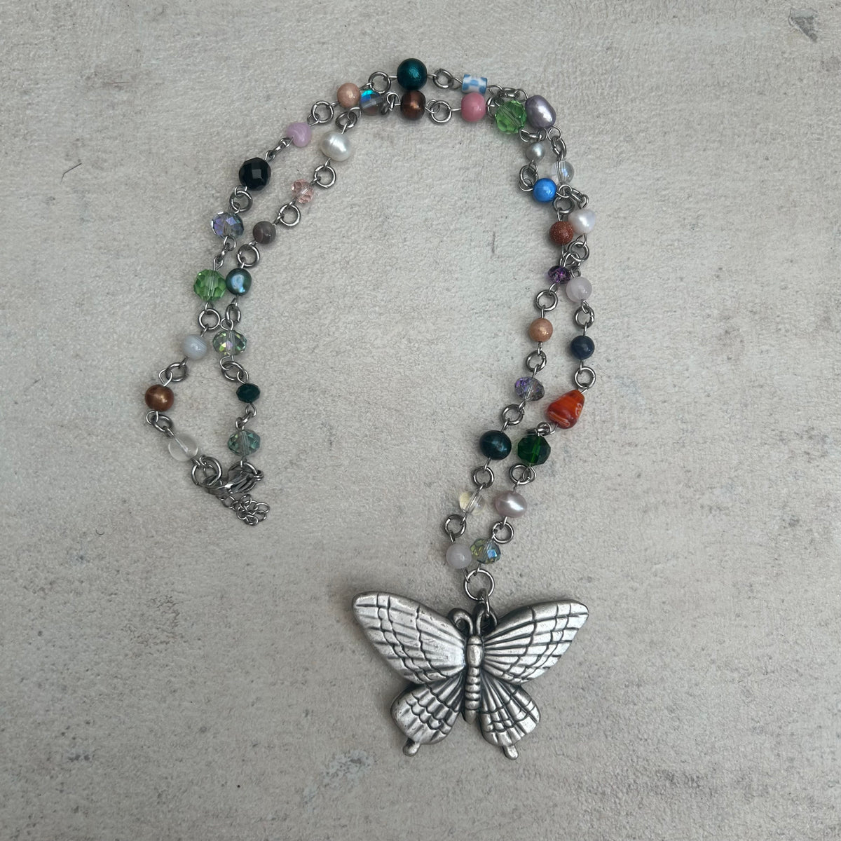 Butterfly weighted beaded necklace