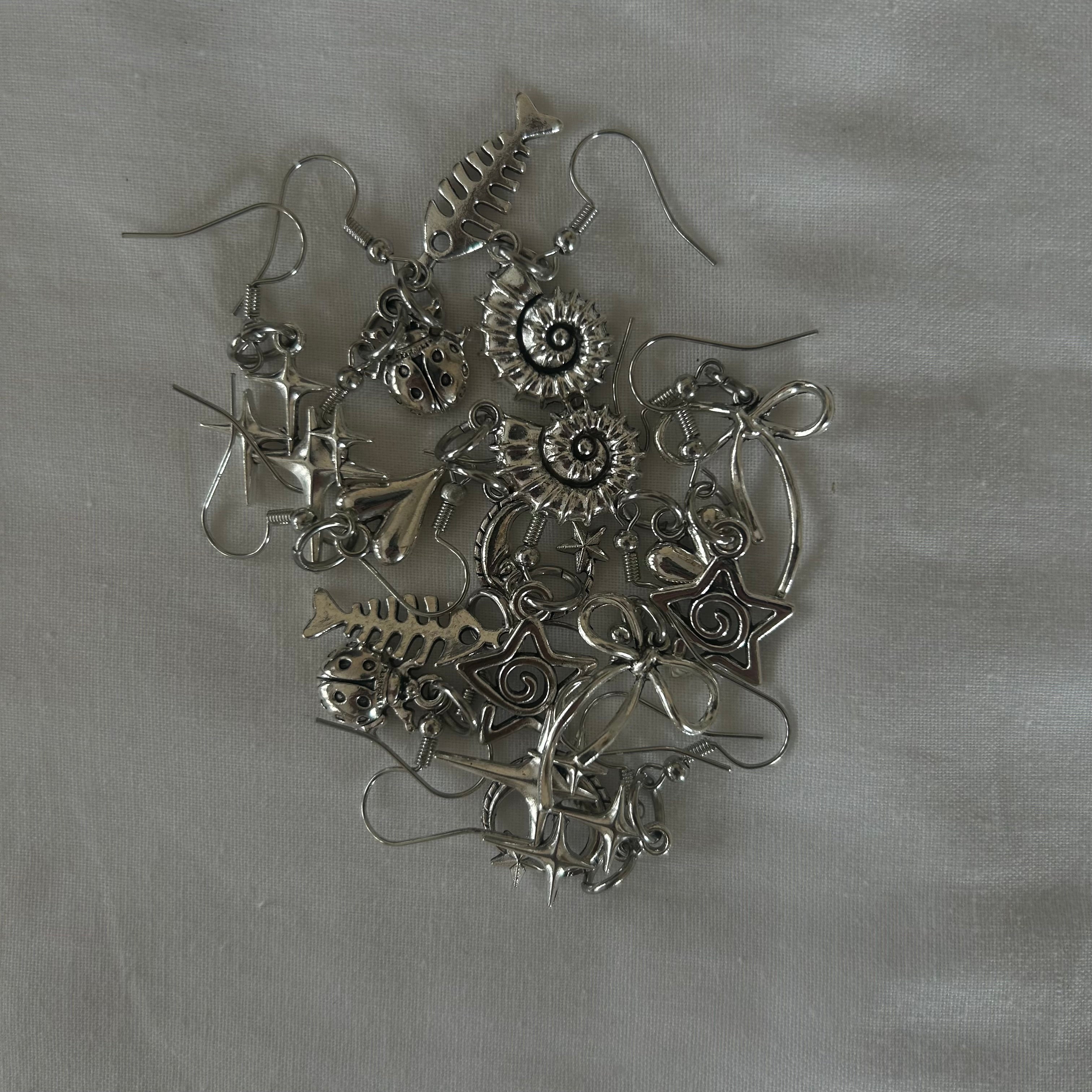 mystery earrings (silver tones)